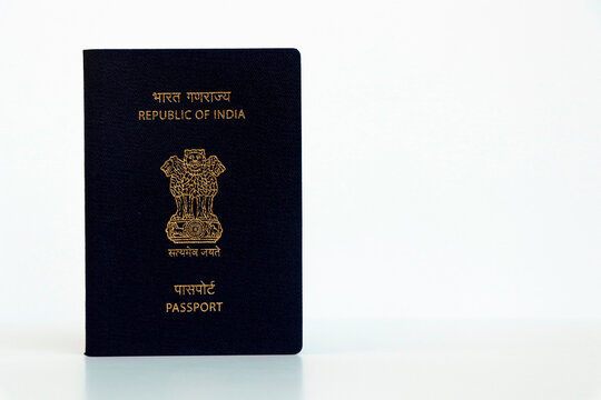 indian national blue passport on a white background in close up