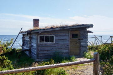 Fishing shack on the shore of the White Sea. White Sea, Kola Peninsula.