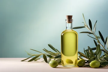 Fototapeten Commercial photography, glass bottle of olive oil with olive branch isolated on flat color wall background with copy space. © dinastya