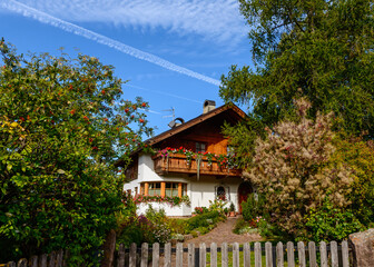 Rustical wooden house with garden