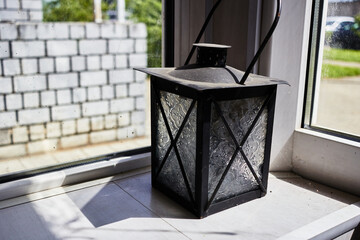 Photograph of black lantern retro lamp stands