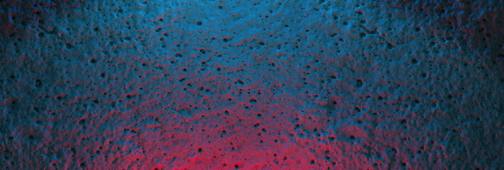 3D rendering of concrete abstract wall with air holes illuminated by red and blue light