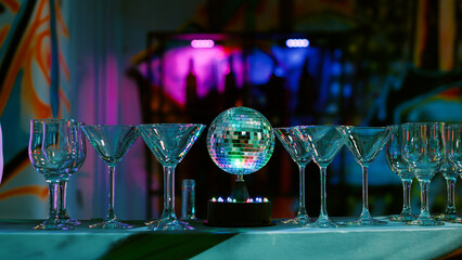 Empty club bar with glasses and drinks, alcoholic beverage in the club used for partying and...