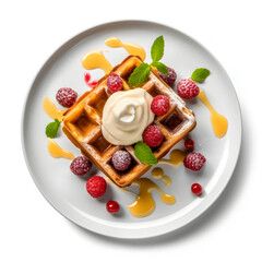 Belgian waffles with ice cream on a white plate and caramel sauce decorated with fresh raspberries and mint on a white background. flat lay. view from above. dessert menu