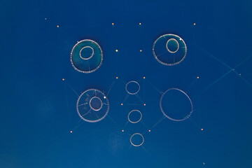 AERIAL TOP DOWN: Floating round constructions for fish farming in Adriatic Sea