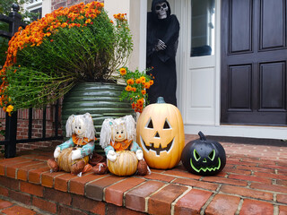 Porch decoration for a happy Halloween. Pumpkins, Skeletons and skulls are the traditional...