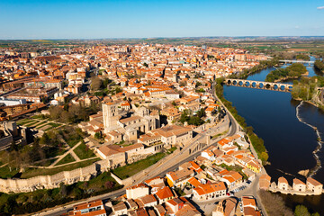 Obraz premium Drone photo of Dureo riverside, residential buildings along river. Castile and Leon, Spain.