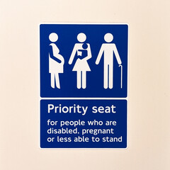 Priority seat signs in London underground 