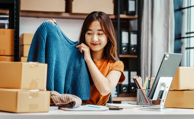 Excited Asians start small businesses, SME entrepreneurs, distribution warehouses with post boxes. owner's small home office, fresh graduate, social media influencers impact on society