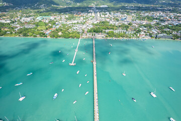 Aerial View Drone shot of Yacht and sailboat parking in marina, Transportation and travel background, Beautiful sea in summer season