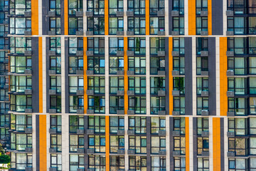 a fragment of a modern high-rise building with windows for the banner background