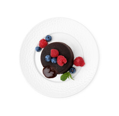 Plate with delicious chocolate fondant, berries and mint isolated on white, top view