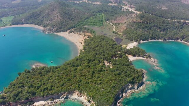 Aerial 4k footage of the natural wonder bay where the ancient city of Antalya Phaselis was founded