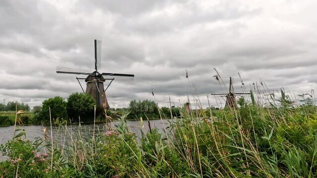 Iconic and historical wooden Dutch windmills and canal system. Built in 1738 and 1740, to keep water out of the low-lying areas. They have been a UNESCO World Heritage Site since 1997. 