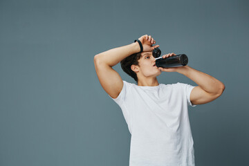 exercise man sport bottle guy water drink t-shirt fit isolated sportsman
