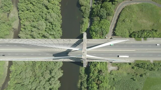 Overhead View Of Cars Driving On The Mary McAleese Boyne Valley Bridge Spanning The Boyne River In County Louth, Ireland. - aerial