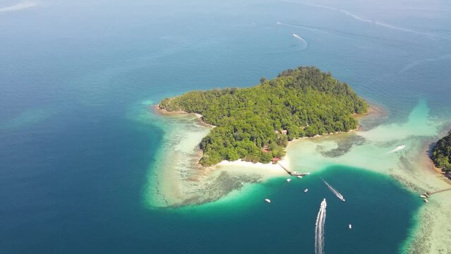 Aerial Overhead View Of Sapi Island On Clear Sunny Day. Push Forward, Establishing Shot