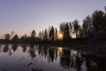 Fototapeta na wymiar Late Spring Sunset at Astotin Lake