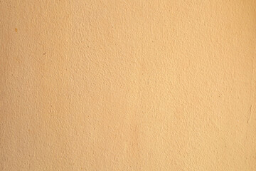Orange yellow painted concrete Wall texture background