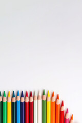Fototapeta premium A group Colored pencils row on white background