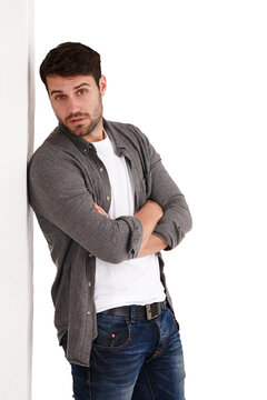 Wall leaning, man and arms crossed portrait with trendy and hipster fashion with a beard. Confidence, cool and male person from New York with stylish clothing isolated on transparent, png background