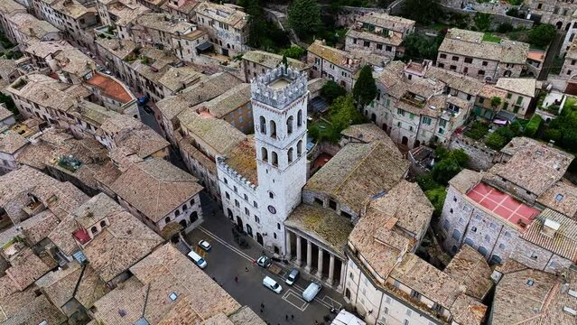 Piazza del Comune Surrounded By Historic Buildings, Torre del Popolo, And Temple of Minerva In Assisi, Italy.