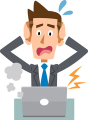 故障したパソコンの前で頭を抱えるビジネスマン

