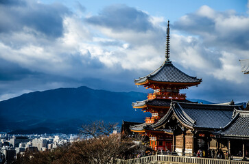 Fototapeta premium A kaleidoscope of culture: Overlooking Kyoto's cityscape reveals a tapestry of tradition and modernity, with the iconic Kiyomizu-dera temple gracing the scene on the right