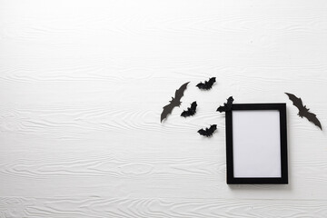 Black frame and bats with copy space on white background