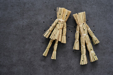 couple halloween curse straw doll Japanese wara ningyo voodoo dark magic background. halloween couple curse straw doll Japanese wara ningyo voodoo dark magic dark background. curse straw 