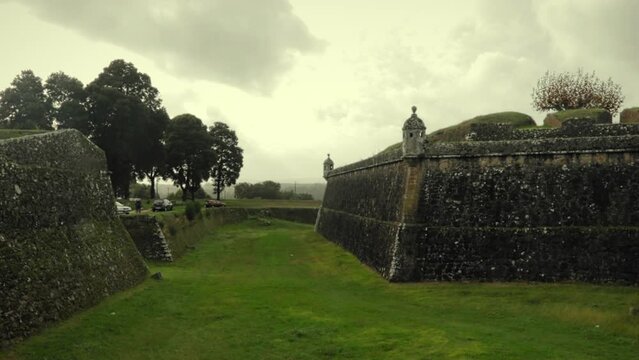 Ancient Castle Fortress Walls on a Cloudy Day