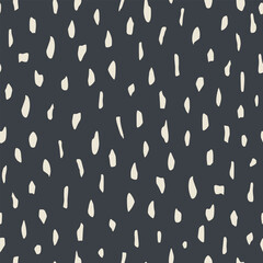 Abstract shapeless spots form a seamless pattern for contemporary textiles, decorative wrapping paper. White and black. Vector.