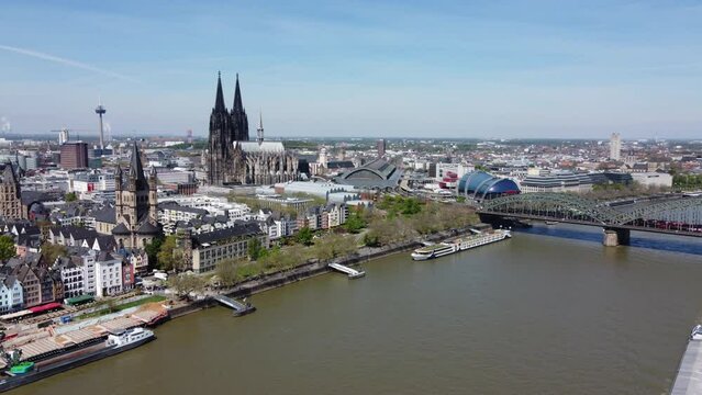 Aerial View Capturing Cologne's Buildings Amidst Riverfront Charms and the Iconic Cathedral.