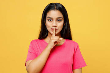Young insighted smart proactive happy Indian woman wear pink t-shirt casual clothes holding index...