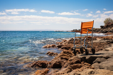 Empty wheelchair on the beach.