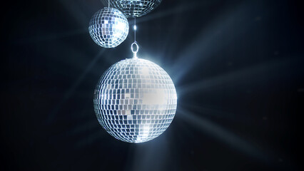 A colorful disco mirror ball illuminates the backdrop of a nightclub. The party lights up the disco ball.