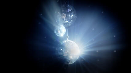 A colorful disco mirror ball illuminates the backdrop of a nightclub. The party lights up the disco...