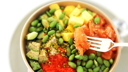 Traditional Hawaiian poke salmon dish in a cardboard box
