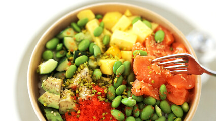 Traditional Hawaiian poke salmon dish in a cardboard box
