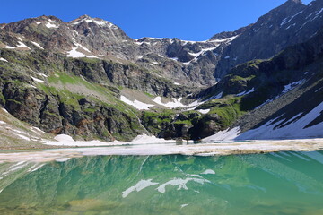 San Grato alpine lake in Valgrisenche natural park, Aosta Valley, Italy