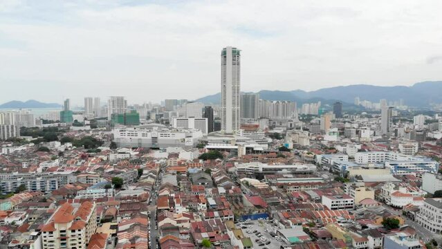 Aerial view of Komtar Buildings and Apartments surrounded by greenery in Malaysia 