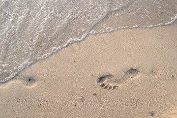 footprints on the beach
