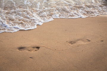 footprints on the beach