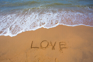 inscription on the beach