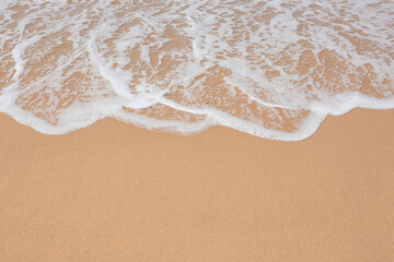 Fototapeta na wymiar wave on the beach