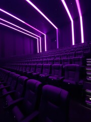 Obraz premium Empty cinema. Empty movie theatre. Modern movies theater for festivals and films presentation. Interior design. Online cinema concept.