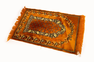 Photo of an orange prayer rug isolated on a white background