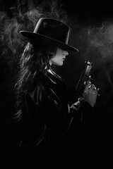 Fototapeta na wymiar Silhouette: a female detective in a coat and hat with a gun in her hands. Dramatic noir portrait in the style of books and detective films of the 1950s. black and white snapshot