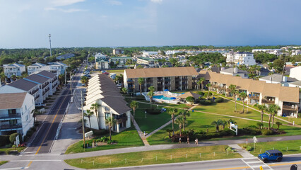 Row of multiple story beach condominium, apartment and vacation rental neighborhood, beach community along 98 Scenic Gulf Drive Miramar Beach in Walton, Florida, USA