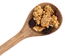 crunchy granola in wooden spoon isolated on white background with clipping path, muesli pile with...